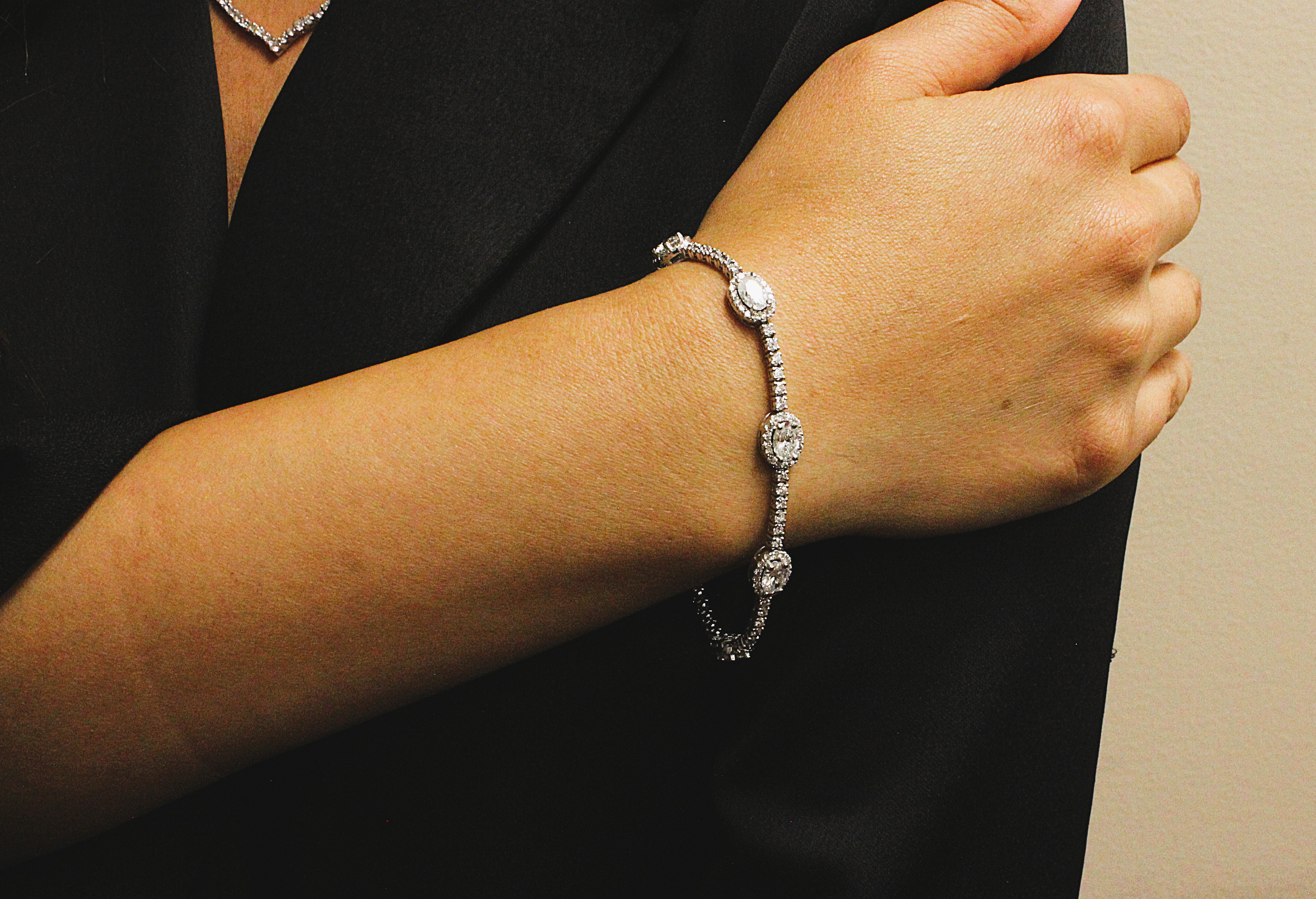 Round & Oval Cut Diamond Tennis Bracelet with Halo's